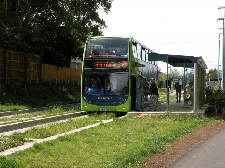 Bus_on_the_Cambridgeshire_Guided_Busway-_in_Impington-_Cambridgeshire-_England.jpg:oar:1:320